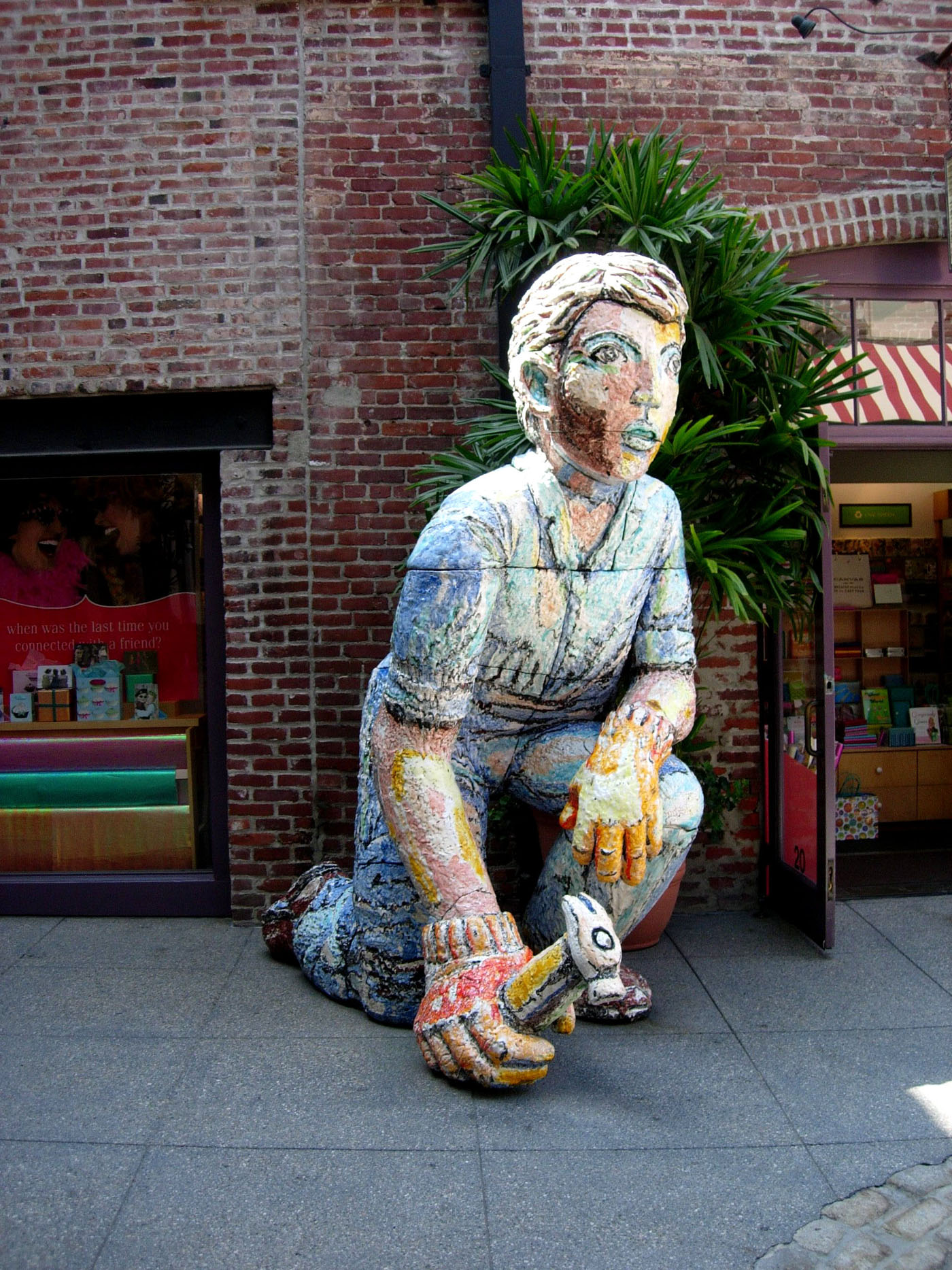 Kneeling Man with Hammer in Pasadena, CA