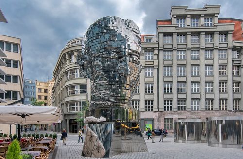 Disaster Capitalism: The Provocative Public Art of Prague's David Černý -  Azure Magazine